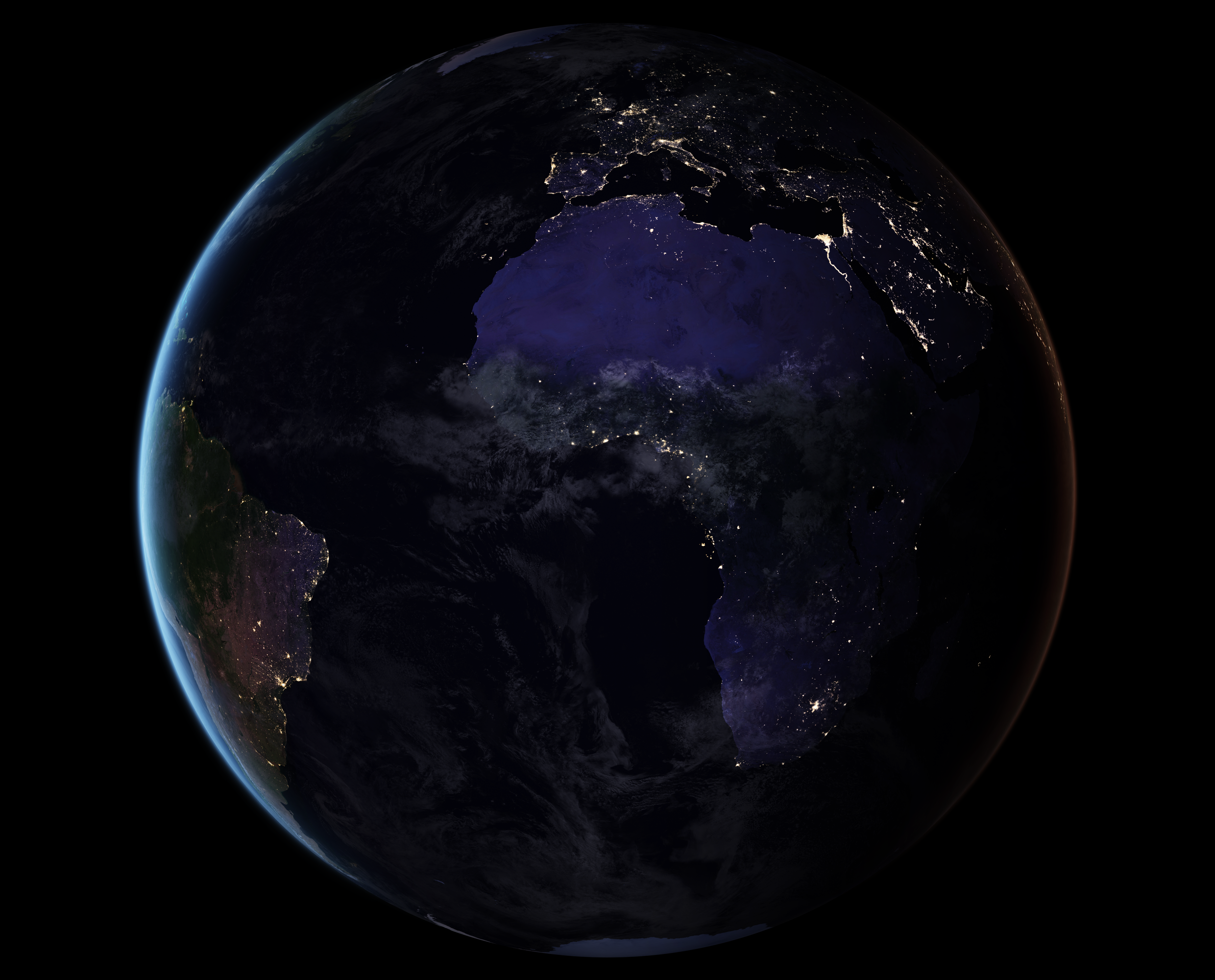 Night-time satellite view of Africa, Europe and the Middle East, traced in city lights